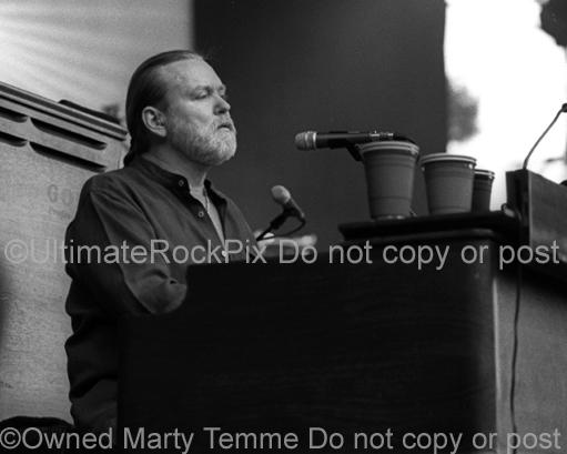 Black and White Photos of Musician Gregg Allman of The Allman Brothers Playing Keyboard in Concert by Marty Temme