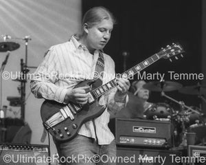Black and White Photos of Guitar Player Derek Trucks of The Allman Brothers Playing in Concert by Marty Temme