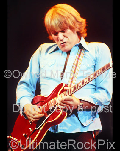 Photo of Alvin Lee of Ten Years After in concert in 1981 by Marty Temme