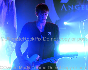 Photo of guitarist David Kennedy of Angels & Airwaves in concert by Marty Temme