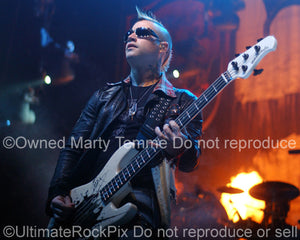 Photo of bass player Johnny Christ of Avenged Sevenfold in concert by Marty Temme