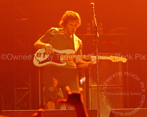 Photo of bass player Tim Commerford of Audioslave in concert by Marty Temme