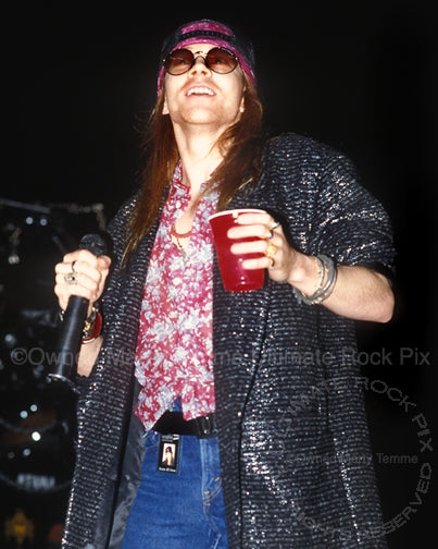 Photo of singer Axl Rose of Guns N' Roses in concert in 1989 by Marty Temme