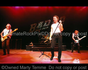 Photos of Paul Rodgers, Rick Wills and Dave Colwell of Bad Company in Concert by Marty Temme