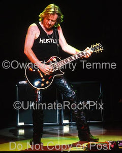 Photos of Guitarist Dave Colwell of Bad Company Onstage in 2001 by Marty Temme