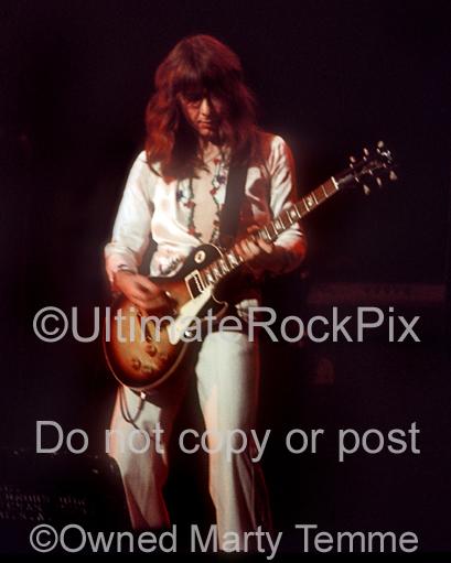 Photo of Mick Ralphs of Bad Company playing a Gibson Les Paul in concert in 1975 by Marty Temme