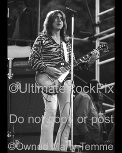 Photo of Mick Ralphs of Bad Company in concert in 1974 by Marty Temme