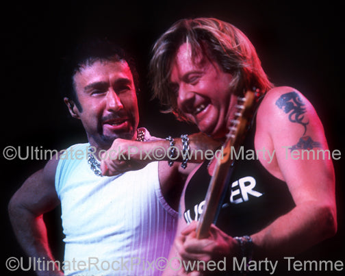 Photo of Paul Rodgers and Dave Colwell of Bad Company in concert by Marty Temme