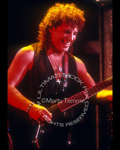 Photo of Neal Schon of Bad English and Journey in concert by Marty Temme