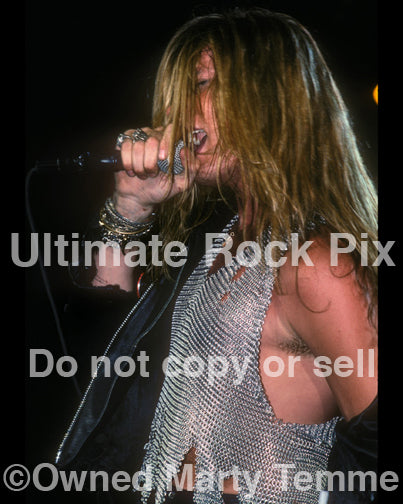 Photo of Sebastian Bach of Skid Row in concert in 1989 by Marty Temme