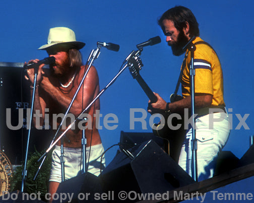 Photo of Mike Love and Al Jardine of The Beach Boys in concert in 1974 by Marty Temme