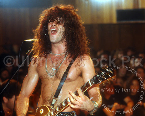   Photo of guitarist Mick Sweda of BulletBoys in concert in 1989 by Marty Temme