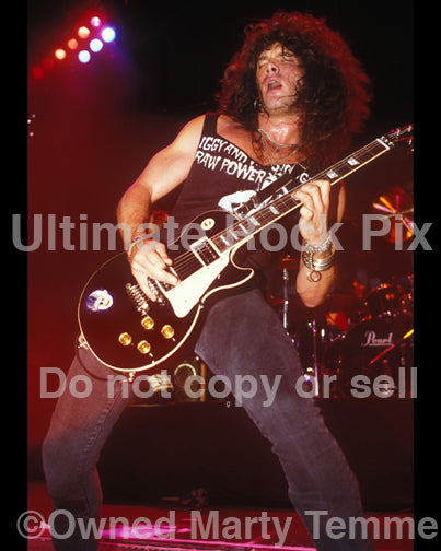 Photo of Mick Sweda of BulletBoys in concert in 1989 by Marty Temme