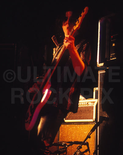 Photo of bassist Sven Pipien of The Black Crowes in concert by Marty Temme