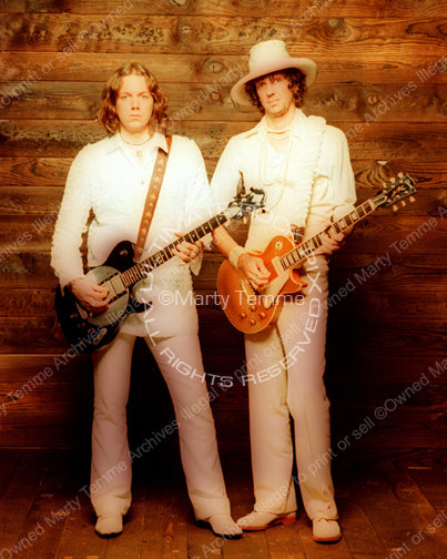 Photo of Rich Robinson and Audley Freed of The Black Crowes during a photo shoot in 1998 by Marty Temme