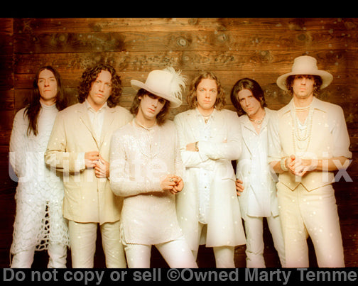 Photo of the band The Black Crowes during a photo shoot in 1998 by Marty Temme