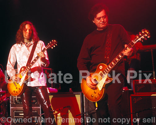 Photo of Jimmy Page of Led Zeppelin and Rich Robinson of The Black Crowes in Concert by Marty Temme