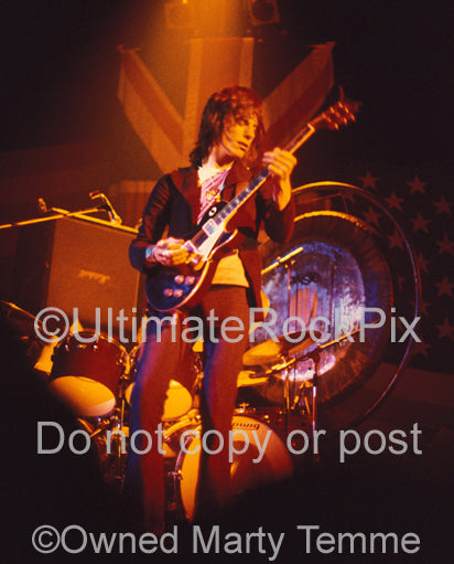 Photo of Jeff Beck playing his Oxblood Les Paul in concert in 1973 by Marty Temme