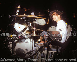 Photo of Charlie Benante of Anthrax in concert in 1991 by Marty Temme