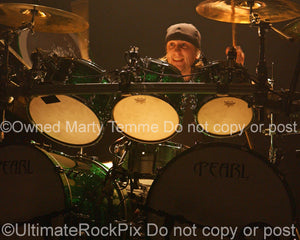 Photo of Michael Thomas of Bullet for My Valentine in concert in 2010 by Marty Temme