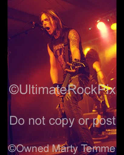 Photo of Matt Tuck of Bullet for My Valentine in concert in 2006 by Marty Temme