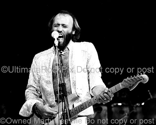 Photo of Maurice Gibb of The Bee Gees in concert in 1979 by Marty Temme