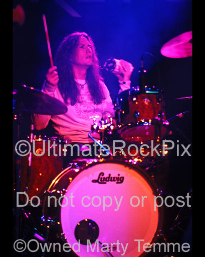 Photo of drummer Blas Elias of Slaughter in concert in Hollywood, California in 2005 by Marty Temme