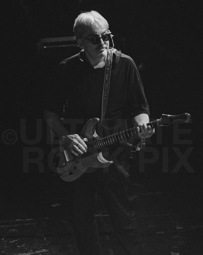 Black and white photo of Chris Stein of Blondie in concert by Marty Temme