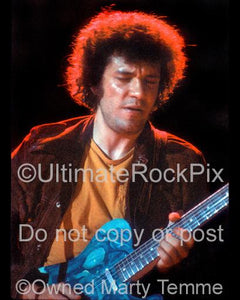 Photo of Mike Bloomfield of The Electric Flag playing a Fender Telecaster in concert in 1973 by Marty Temme