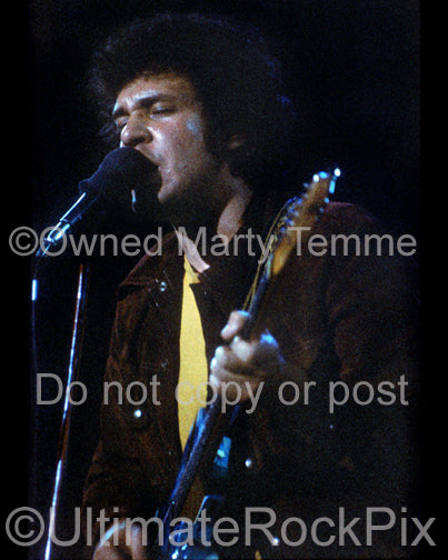 Photo of guitarist Mike Bloomfield in concert in 1973 by Marty Temme
