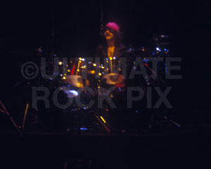 Photo of Albert Bouchard of Blue Oyster Cult in concert in 1977 by Marty Temme