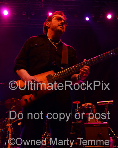 Photo of Buck Dharma of Blue Oyster Cult in concert in 2013 by Marty Temme