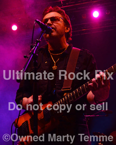 Photo of guitarist Buck Dharma of Blue Oyster Cult in concert in 2013 by Marty Temme
