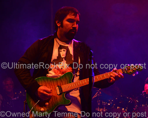 Photo of guitarist Richie Castellano of Blue Oyster Cult in concert in 2013 by Marty Temme