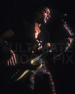 Photo of Alec John Such of Bon Jovi in concert in 1992 by Marty Temme