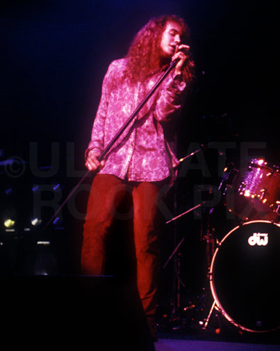 Photo of singer Daniel MacMaster of Bonham in concert in 1992 by Marty Temme