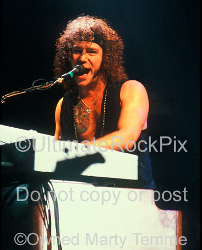 Photo of keyboardist David Bryan of Bon Jovi onstage in 1992 by Marty Temme