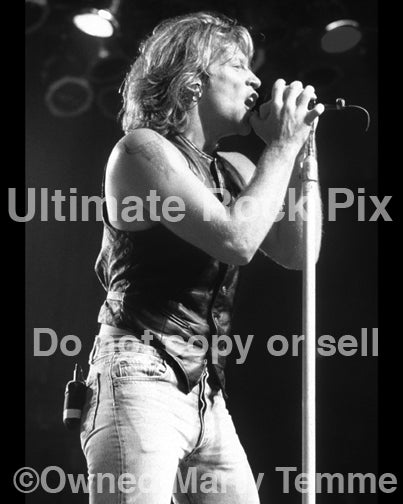 Black and white photo of singer Jon Bon Jovi onstage in 1992 by Marty Temme