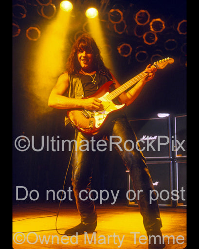 Photo of Richie Sambora of Bon Jovi in concert in 1992 by Marty Temme