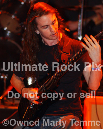 Photo of guitar player Jason Richardson in concert by Marty Temme