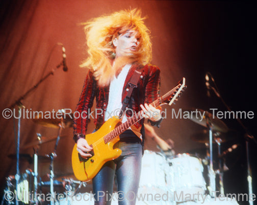 Photo of guitarist Michael Kelly Smith of Britny Fox in concert in 1989 by Marty Temme