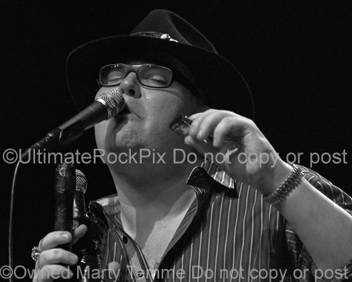 Photo of singer John Popper of Blues Traveler in concert in 2009 by Marty Temme