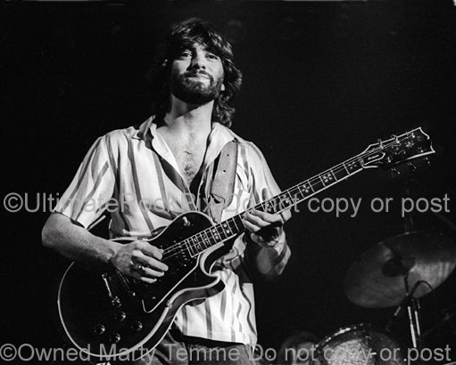 Photo of guitar player Todd Sharp of Bob Welch in concert in 1978 by Marty Temme