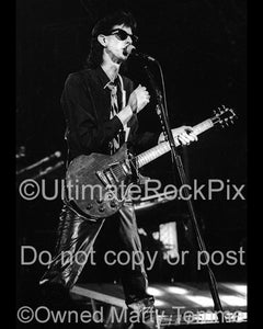 Photo of Ric Ocasek of The Cars in concert in 1978 by Marty Temme