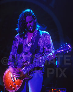 Photo of guitarist Peter Klett of Candlebox in concert by Marty Temme