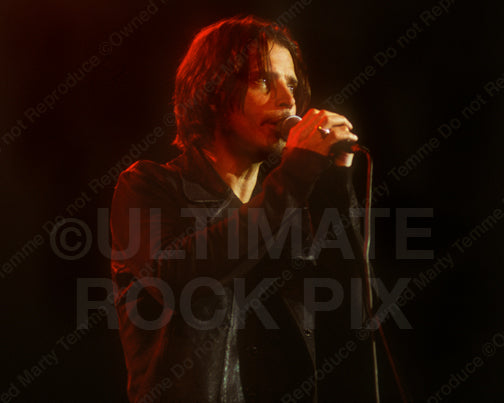 Photo of Chris Cornell singing in concert in 2000 by Marty Temme