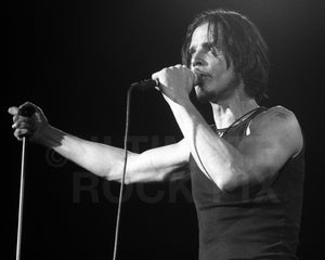 Black and white photo of Chris Cornell singing in concert by Marty Temme