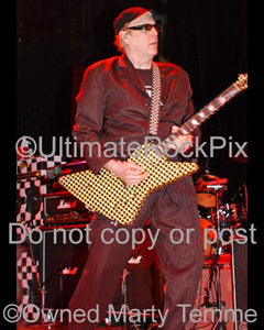 Photos of Guitar Player Rick Nielsen of Cheap Trick in Concert in 2006 by Marty Temme