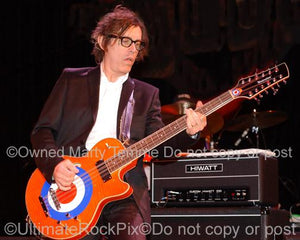 Photos of Tom Petersson of Cheap Trick in Concert in 2006 by Marty Temme