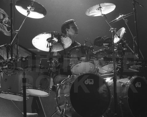 Photo of Danny Seraphine of Chicago in concert in 1990 by Marty Temme